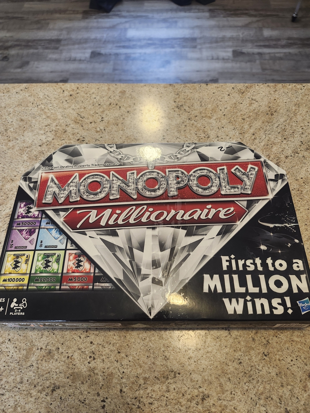 Hasbro Monopoly Millionaire Board Game - Black, Red, Silver